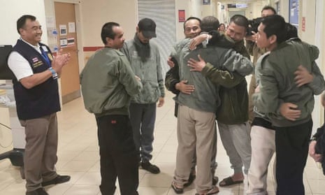 Thai hostages freed by Hamas on Sunday hug fellow Thais released earlier, at Israel’s Shamir Medical Centre
